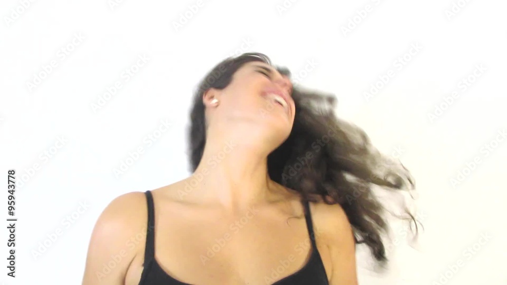 Beautiful woman doing some fine gestures and waving her hair on white background Beautiful woman doing some fine gestures and waving her hair on white background