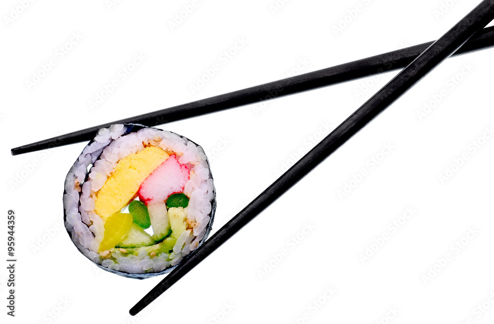 Sushi roll with black chopsticks isolated on white background Sushi roll with black chopsticks isolated on white background