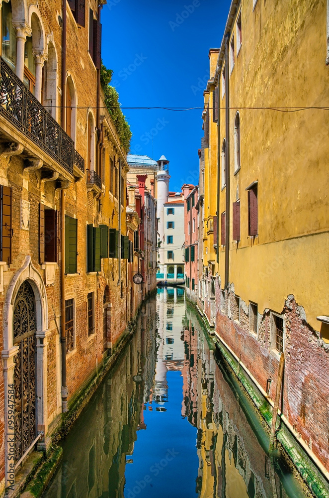 Scenic canal on sunny day, Venice, Italy