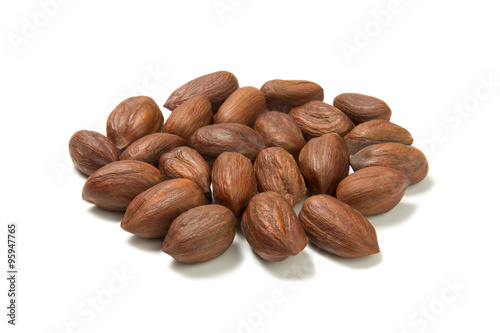 Hazelnuts over white background