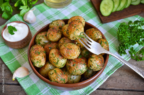 Young potatoes fried in butter with garlic and dill