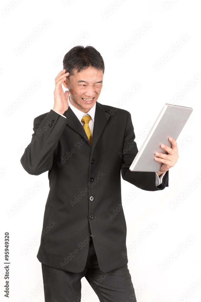 Asian business man using digital tablet computer. Asian business man using digital tablet computer.