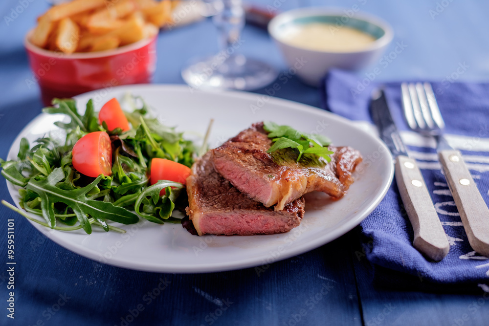 Steak with pomme frites and bearnaise sauce Steak with pomme frites and bearnaise sauce