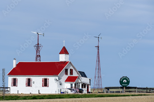 wooden church with red roof, Val Marie, Saskatchewan, Canada photo