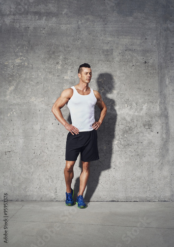 Full body fitness portrait of muscular man