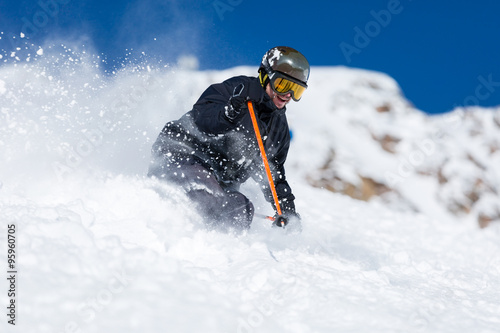 Bilde på lerret Skier skiing on ski slope