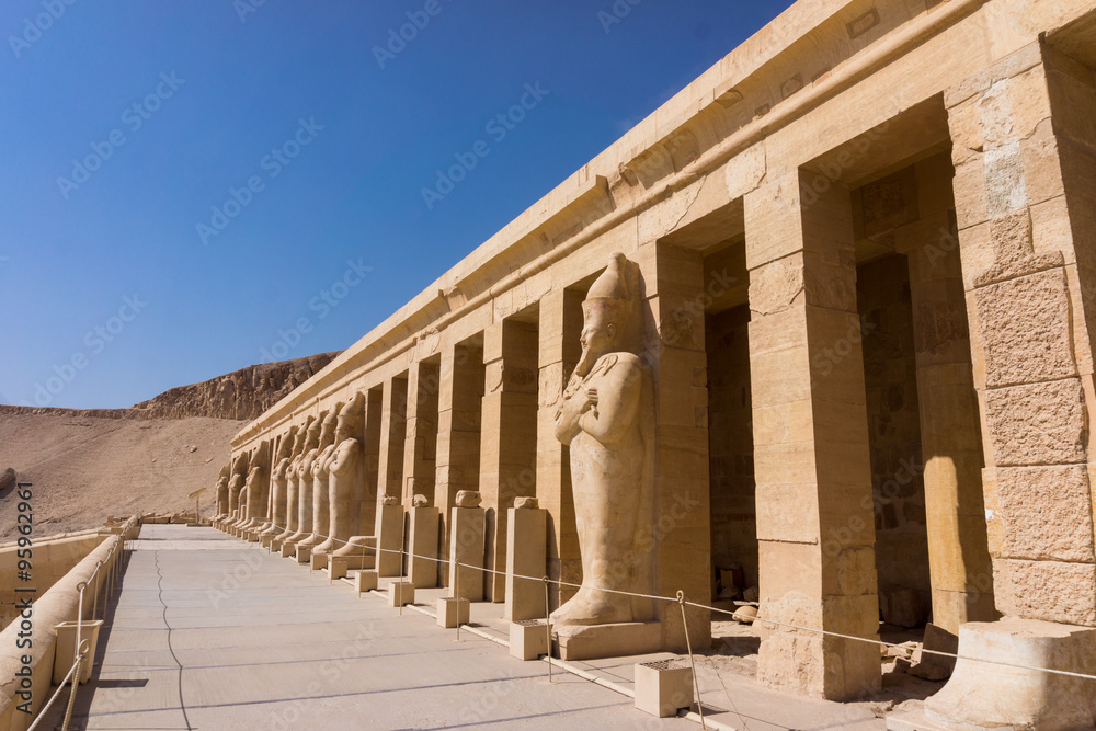 The temple of Hatshepsut near Luxor in Egypt.  Statues of Queen