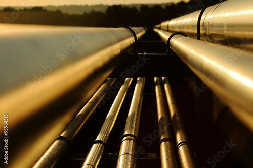 Close up view of steel golden pipes in refinery