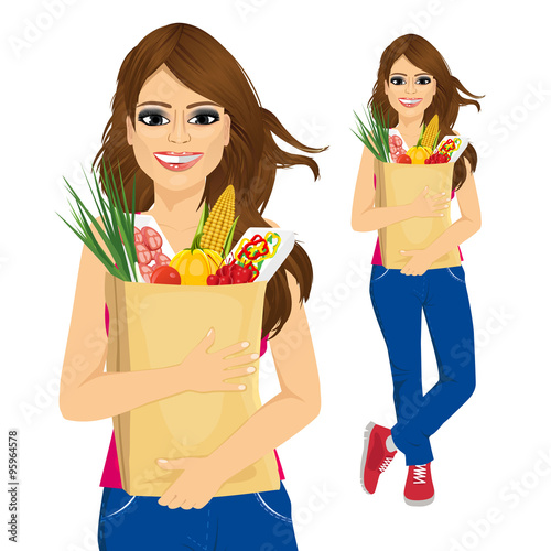 young woman carrying grocery paper bag