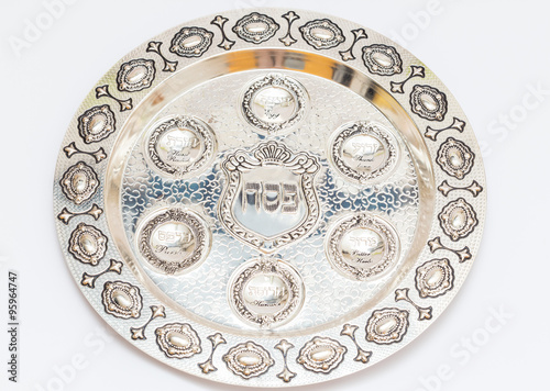 A silver bowl for Passover. Seder Plate. Text - Passover