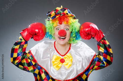 Fototapeta Naklejka Na Ścianę i Meble -  Funny clown with boxing gloves