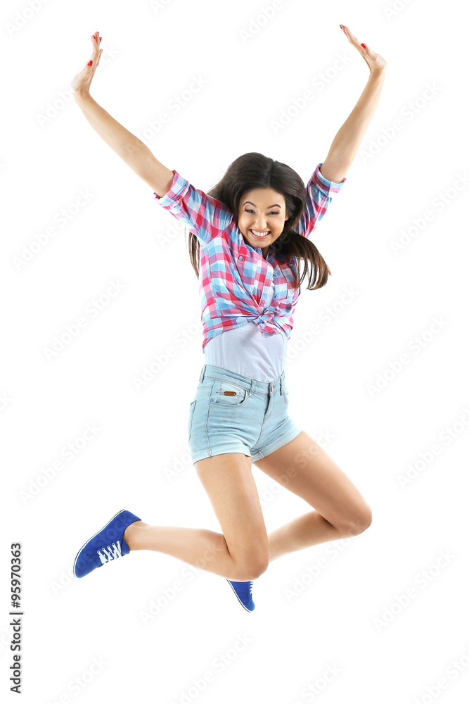 Active girl jumping in joy, isolated on white Active girl jumping in joy, isolated on white