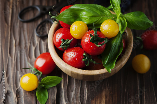 Concept of healthy eating with tomato and basil