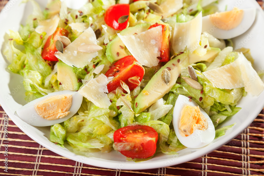 Salad with iceberg, cherry tomato and avocado Salad with iceberg, cherry tomato and avocado