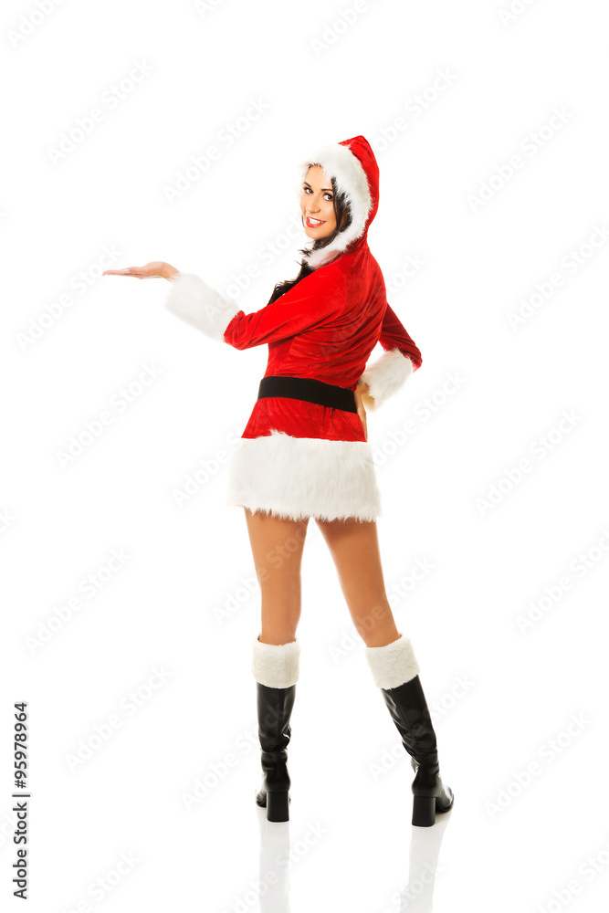Back view santa woman holding something invisible Back view santa woman holding something invisible