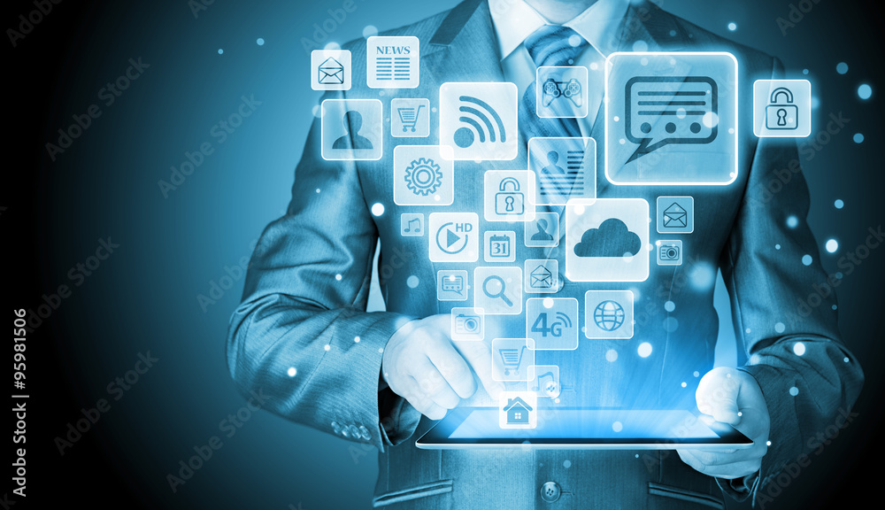 Business man using tablet PC with social media icon set Business man using tablet PC with social media icon set