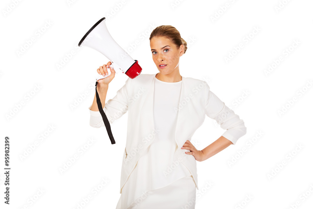 Young businesswoman holding megaphone Young businesswoman holding megaphone