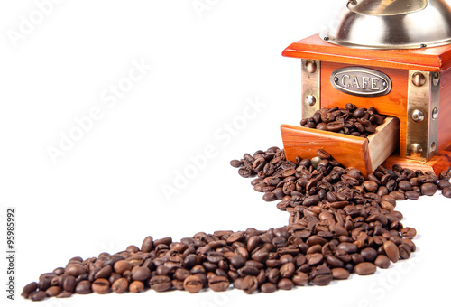 Coffee grinder with coffee beans, isolated on white