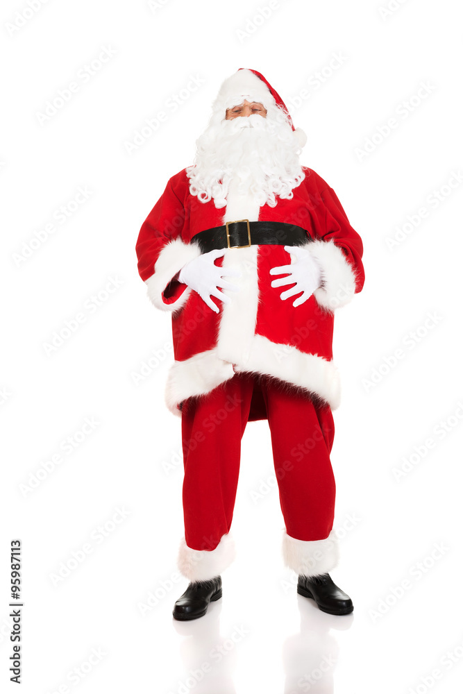 Happy Santa Claus holding his fat belly Happy Santa Claus holding his fat belly