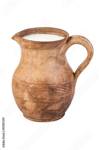 Ceremic (clay) jug with milk