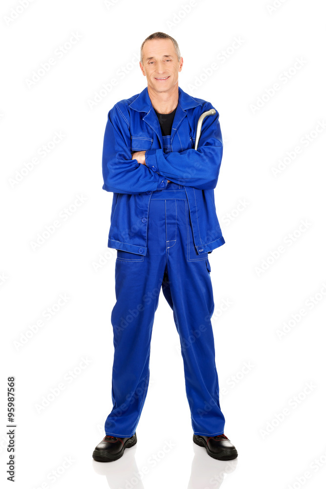 Repairman holding wrench Repairman holding wrench