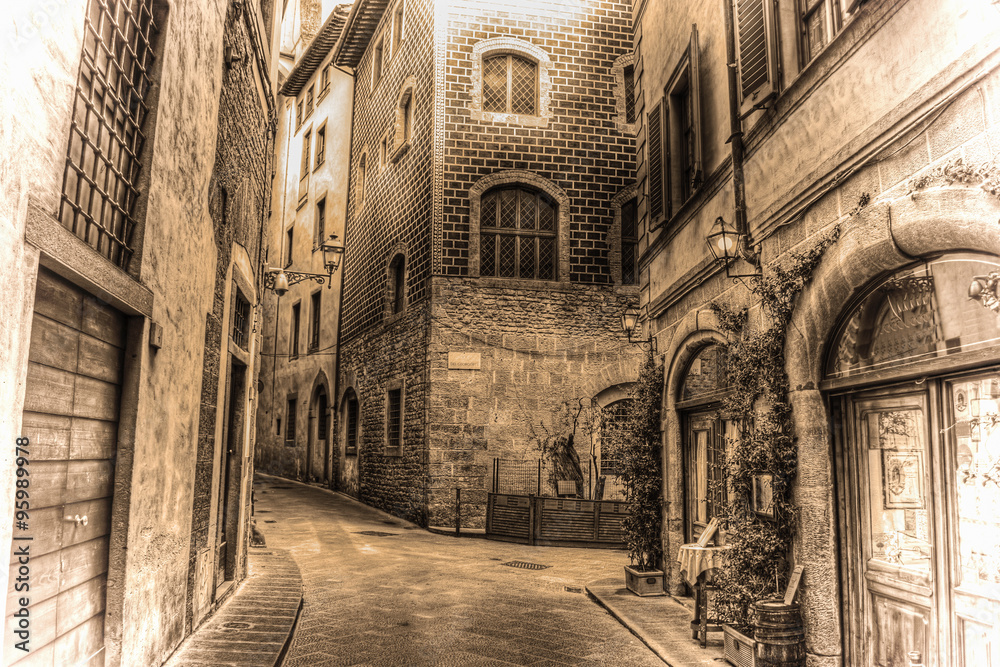 beautiful narrow street in Florence in sepia tone