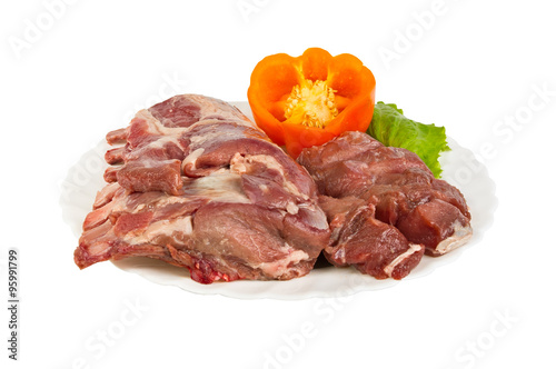 semi-finished products made of wild boar meat on the plate, isolated