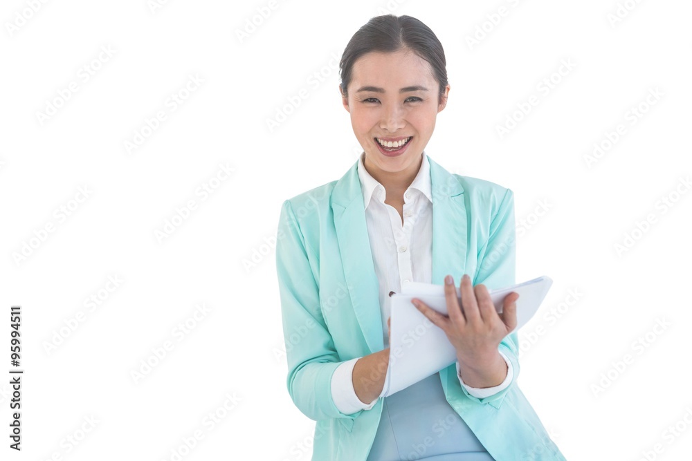 Smiling businesswoman holding notes Smiling businesswoman holding notes