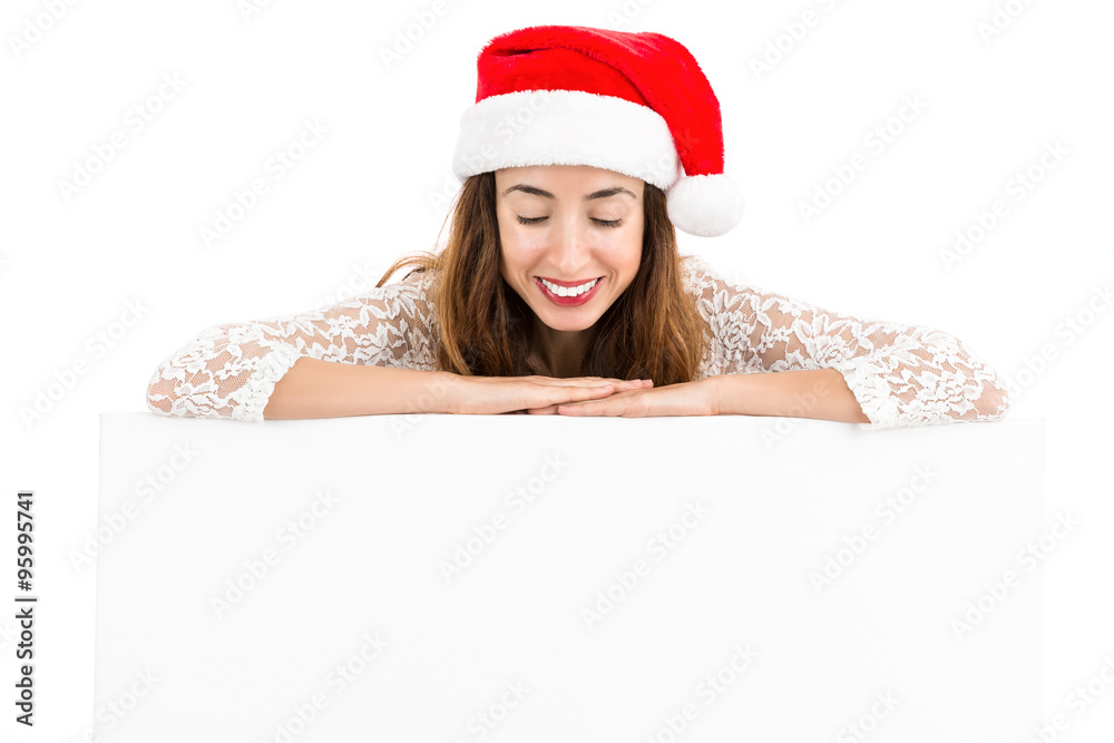 Christmas woman looking down on an advertising banner Christmas woman looking down on an advertising banner