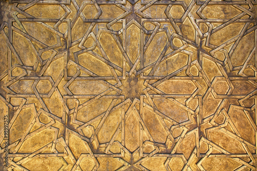 Intricate oriental golden pattern in Fes  Morocco.