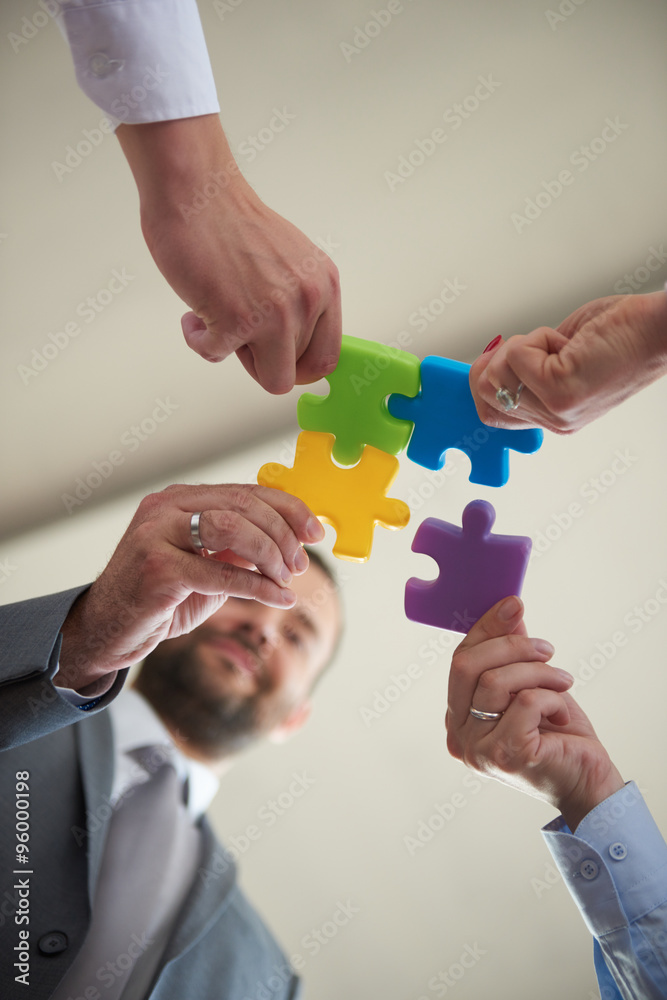 business people group assembling jigsaw puzzle business people group assembling jigsaw puzzle