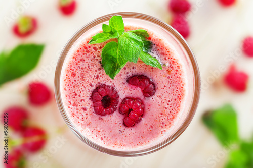 Delicious milk shake, raspberry smoothie, top view, close-up