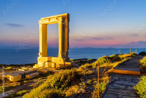 The Ancient marble gate "Portara" - the entrance to the temple of Apollo, Naxos island, Cyclades, Greece.