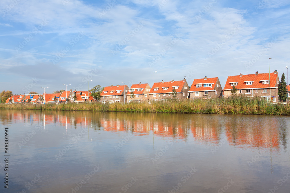 row of houses along the river