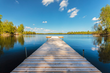 Wooden jetty on a sunny day in Sweden