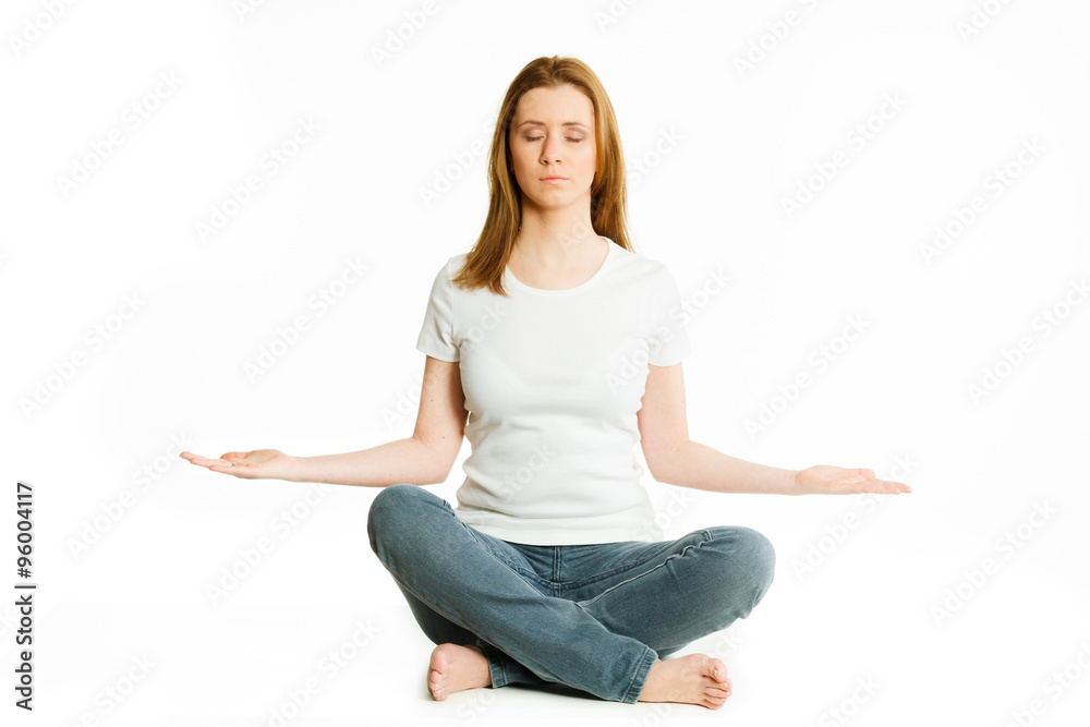 beautiful young woman sitting cross-legged beautiful young woman sitting cross-legged