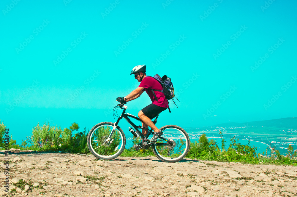 Fototapeta premium Cyclist in the mountains