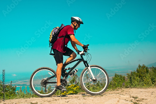 Biker rides at mountain