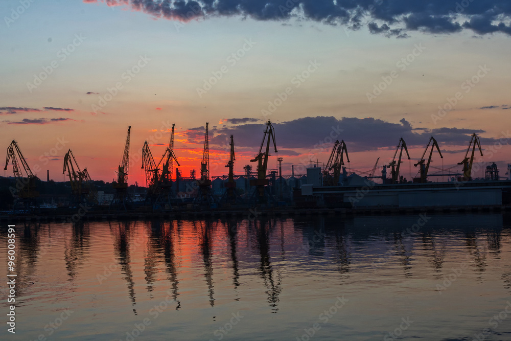 Silhouette of sea port at dusk. Odessa, Ukraine