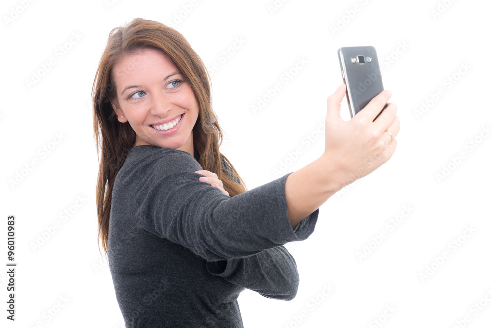 junge frau macht ein foto von sich mit dem handy junge frau macht ein foto von sich mit dem handy