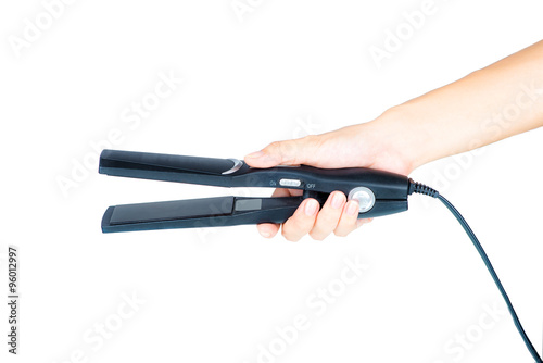 Straightening iron in hand