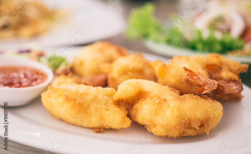 Fried shrimps plate close up