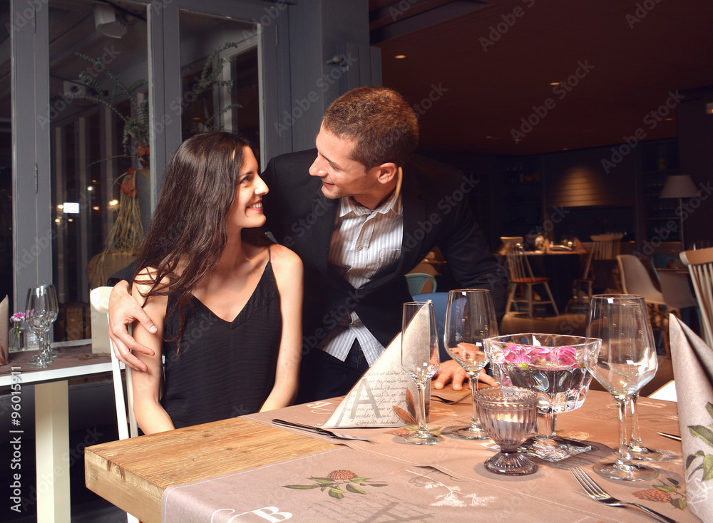 couple in love having dinner at a romantic restaurant couple in love having dinner at a romantic restaurant