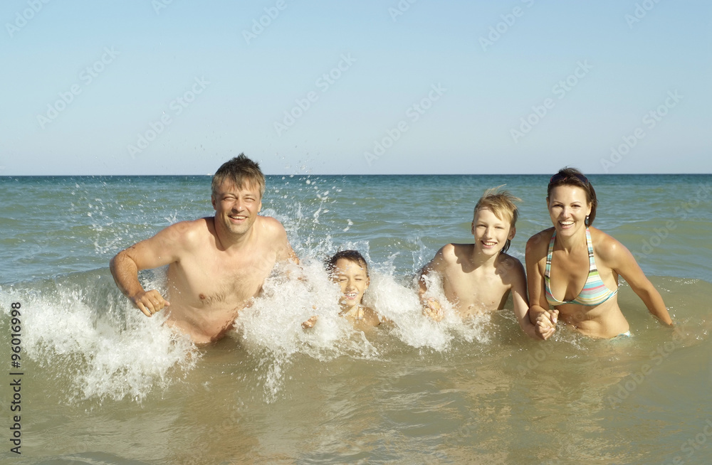 Happy family at beach Happy family at beach