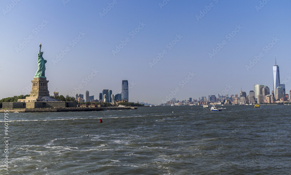 Statue of Liberty and Skyline from river