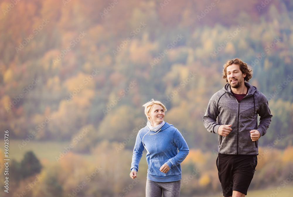 Fototapeta premium Beautiful couple running