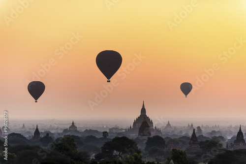 Hot air balloon over plain of Bagan in misty morning, Myanmar © ktianngoen0128