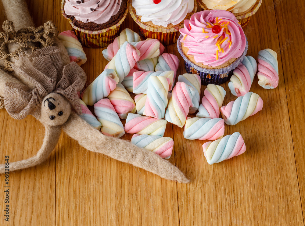 handmade rabbit doll with heap of sweets handmade rabbit doll with heap of sweets