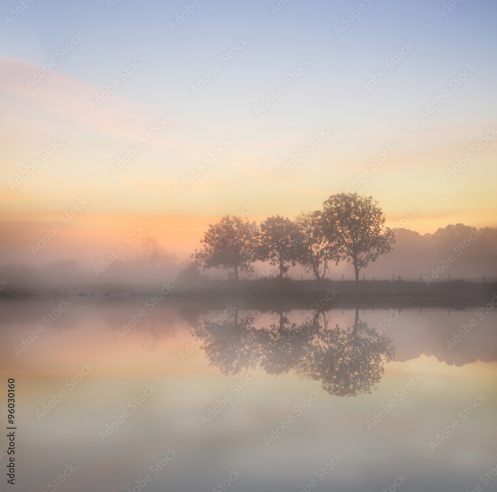 Stunning vibrant Autumn foggy sunrise English countryside landsc Stunning vibrant Autumn foggy sunrise English countryside landsc