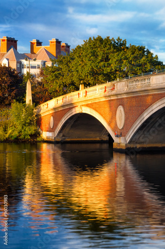 Boston Cambridge bridge over the Charles River. Beautiful reflections in morning light.